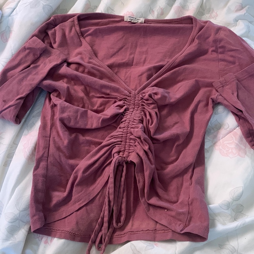 Long sleeve adjustable waist.